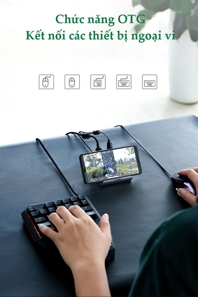 Bộ chia cổng USB 2.0 UGREEN CM214 Chia 2 cổng USB 2.0 hỗ trợ chức năng otg – Kèm giá đỡ điện thoại