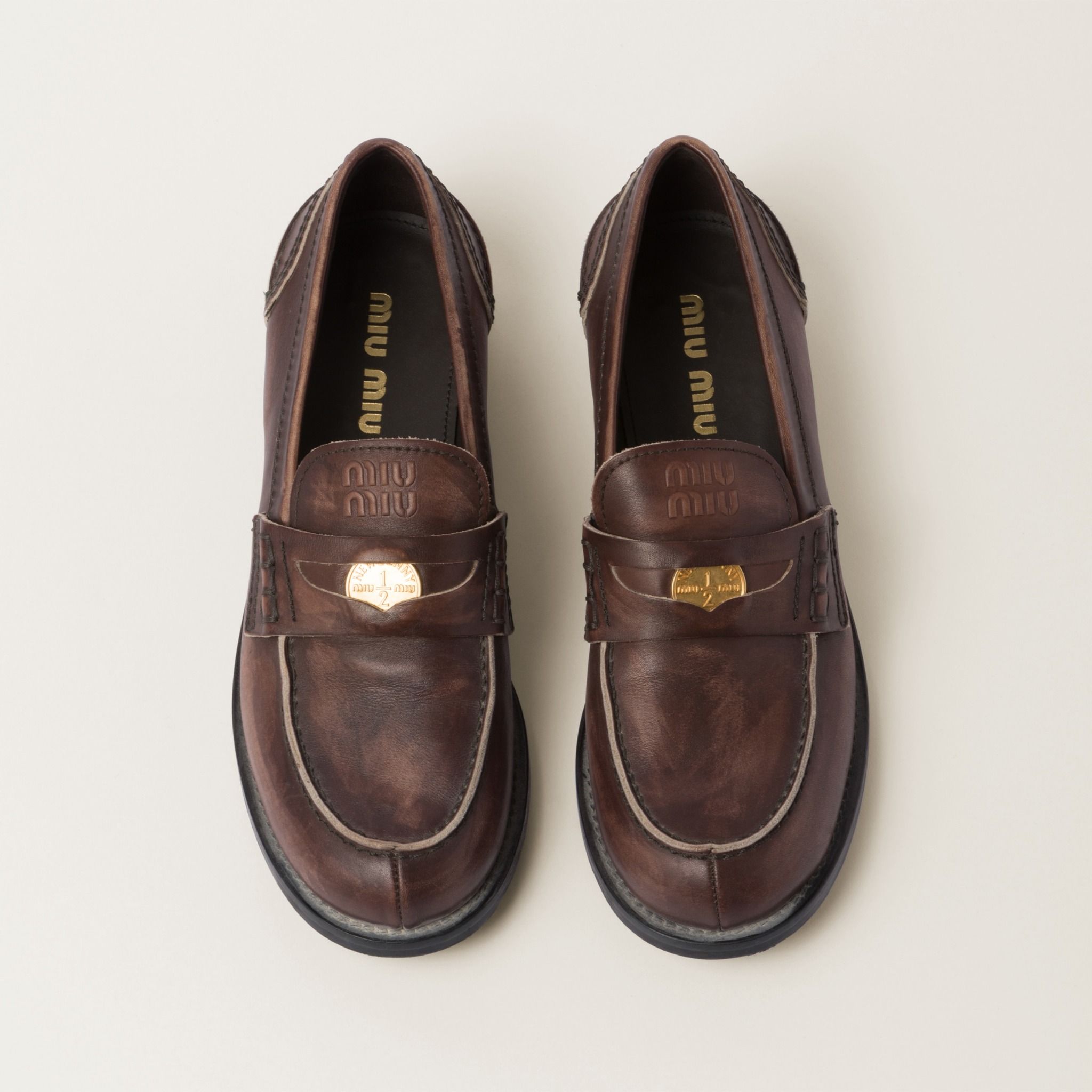  Giày Nữ Miu Miu Leather Penny Loafers 'Ebony' 