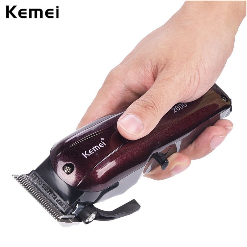 Tông đơ cắt tóc không dây Kemei KM-2600 chuyên nghiệp với pin Lithiumion siêu khủng có thể sử dụng cắm điện trực tiếp