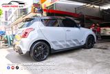  Tem Suzuki Swift 