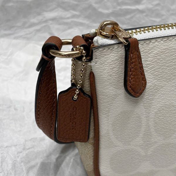 809 - Túi Coach kẹp nách Nolita 19 In Signature Canvas - CA444