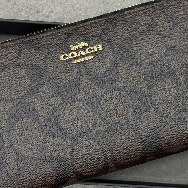 784 - Ví Coach Cầm Tay Dáng Dài Zip Signature Black - C4452
