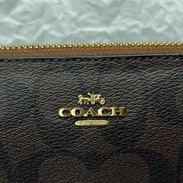 808 - Túi Coach kẹp nách Nolita 19 In Signature Canvas - CS442