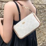 809 - Túi Coach kẹp nách Nolita 19 In Signature Canvas - CA444