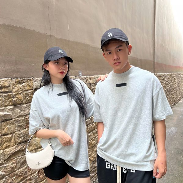 730 - Áo Fear Of God Essentials 'Light Heather' SS24