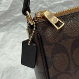 808 - Túi Coach kẹp nách Nolita 19 In Signature Canvas - CS442