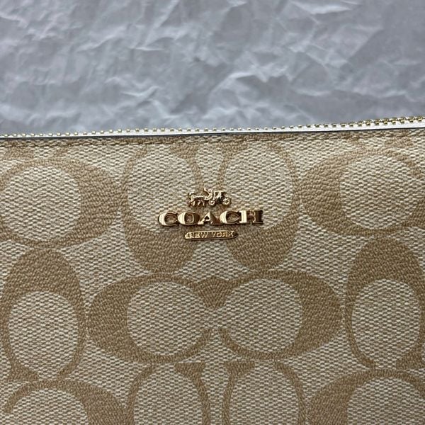 810 - Túi Coach kẹp nách Nolita 19 In Signature Canvas - CS442