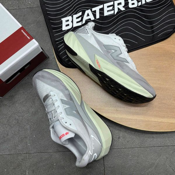 818 - Giày thể thao New Balance Fuelcell Rebel V5 Raincloud -  WFCXLD5