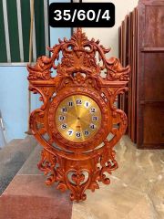 Đồng hồ gỗ hoa văn