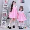Đầm kate cổ sen thêu tim dễ thương cho bé gái DGB292303