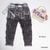 Quần jeans dài wash rách kèm phụ kiện dễ thương cho bé trai QTB196924