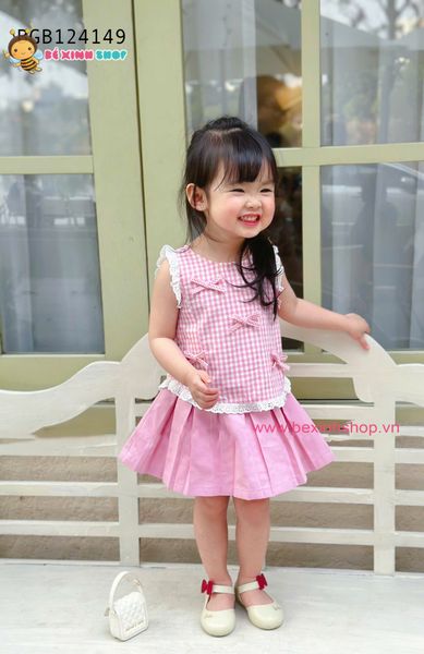 Set chân váy xếp ly phối áo caro đính nơ dễ thương cho bé gái BGB124149
