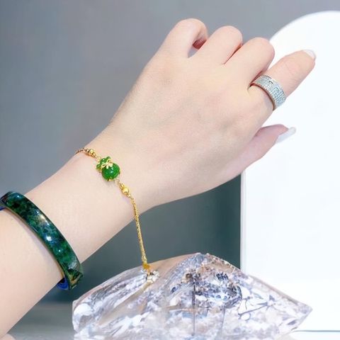  Lắc tay Vàng gắn Túi tiền Ngọc bích 