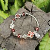  Vòng Tay Cỏ 4 Lá Thạch Anh Tóc Đỏ Bọc Bạc Mix Charm Bạc 