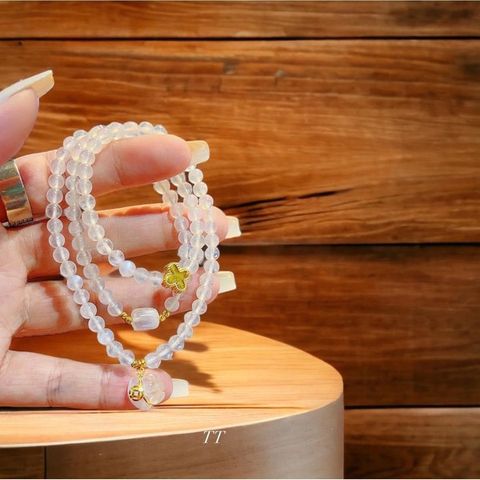  Vòng tay Moonstone mix Charm vàng 