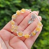  Vòng Tay Thạch Anh Tóc Vàng Mix Cỏ 4 Lá Charm Bạc 