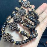  Vòng tay Trầm hương sánh mix sen và bi vàng 6mm 