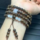  Vòng tay Trầm hương sánh chìm mix cỏ 4 lá và đá bạch ngọc 