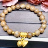  Vòng tay Trầm hương rừng Nha Trang 8 mm charm vàng 24k 