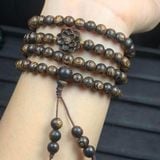  Vòng tay Trầm hương sánh chìm 6mm mix sen và bi vàng 10k 
