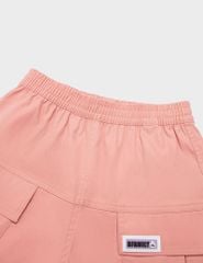 Quần short cạp chun bé gái mác trang trí