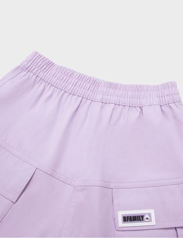 Quần short cạp chun bé gái mác trang trí