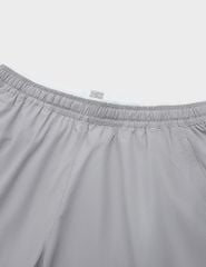 Quần short gió nam cạp chun túi khóa gấu xẻ tà