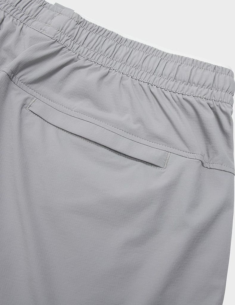 Quần short gió nam cạp chun túi khóa gấu xẻ tà