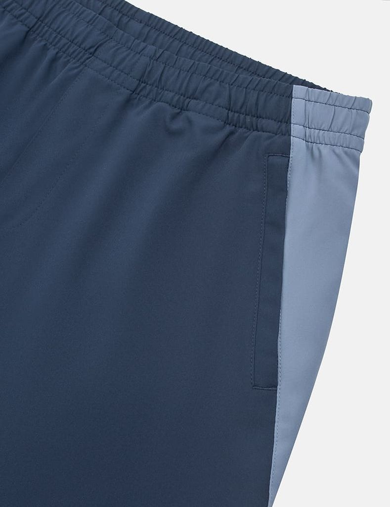 Quần short gió cạp chun túi khóa chéo phối sườn