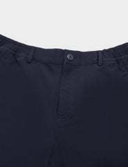 Quần short gió cạp âu túi khóa xẻ gấu