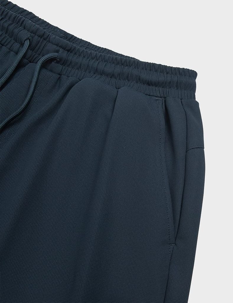 Quần short nam dệt kim ép gấu dáng ôm vừa