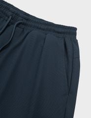 Quần short nam dệt kim ép gấu dáng ôm vừa