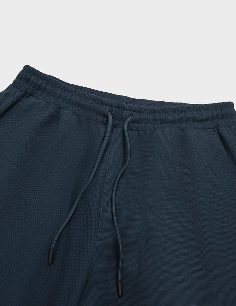 Quần short nam dệt kim ép gấu dáng ôm vừa