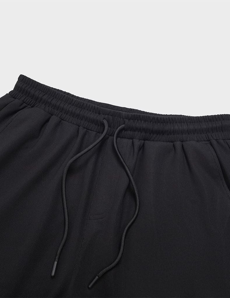 Quần short nam dệt kim ép gấu dáng ôm vừa