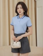Quần short khaki nữ nắp túi đính khuy trang trí