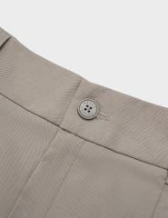 Quần short khaki nữ nắp túi đính khuy trang trí