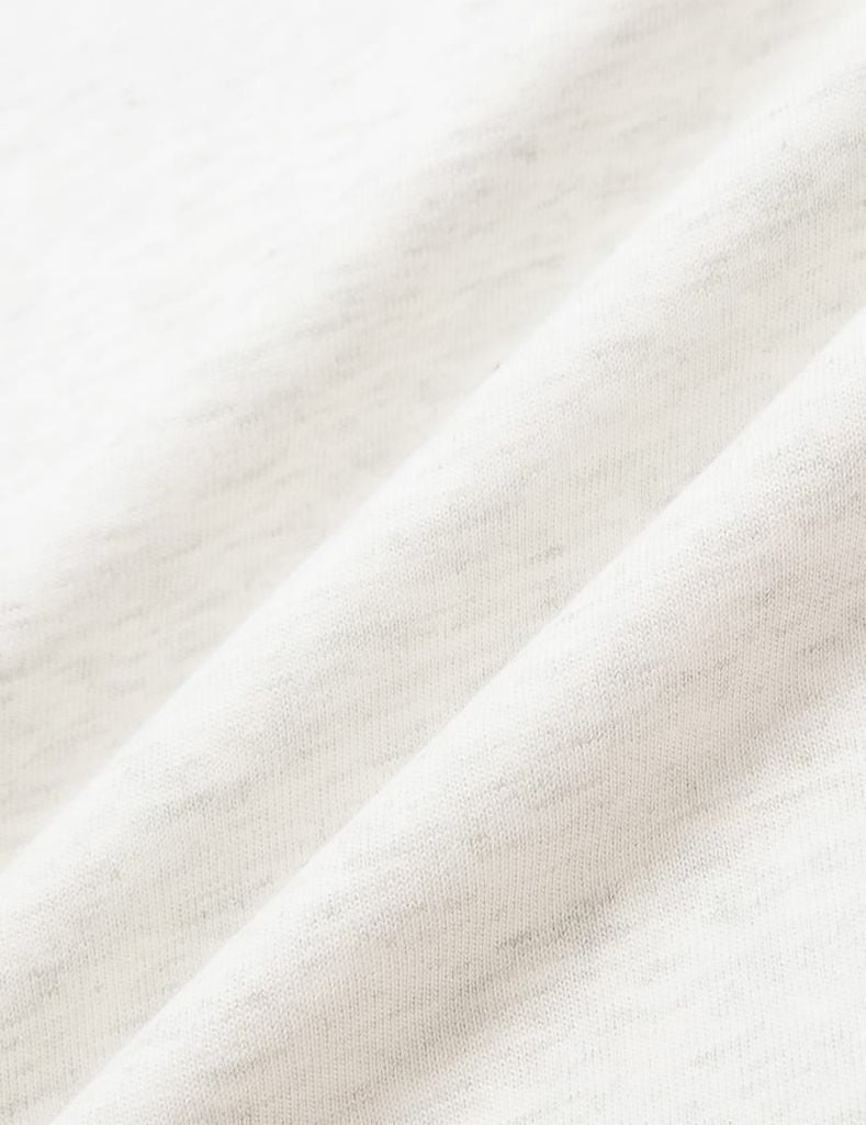 Áo T-shirt nữ phối lé vải dọc vai hình in trước ngực