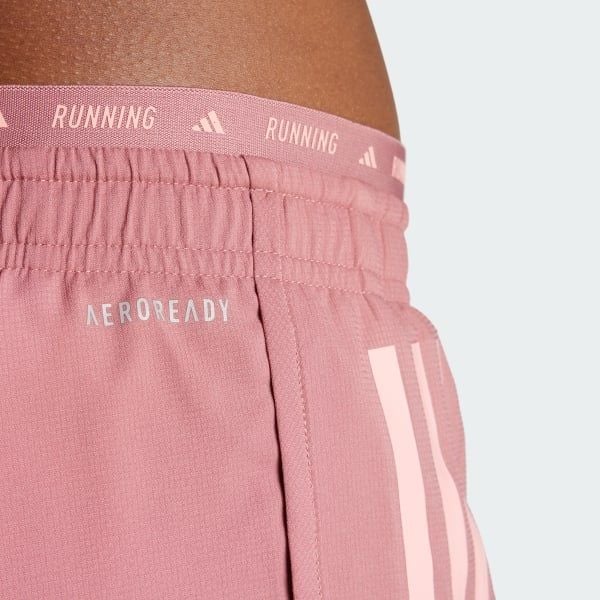 Quần short chạy bộ adidas 2 Trong 1 3 Sọc Own the Run Nữ - IS9574