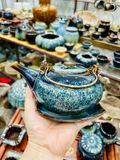 Bộ ấm chén hỏa biến có quai đồng dáng tròn sang trọng 