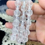  VÒNG TAY ĐÁ PHONG THUỶ THẠCH ANH TRẮNG CHẠM HOA SEN 