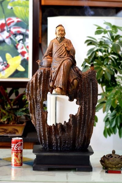  Tượng thần trà ngồi lũa ấm bách xanh 