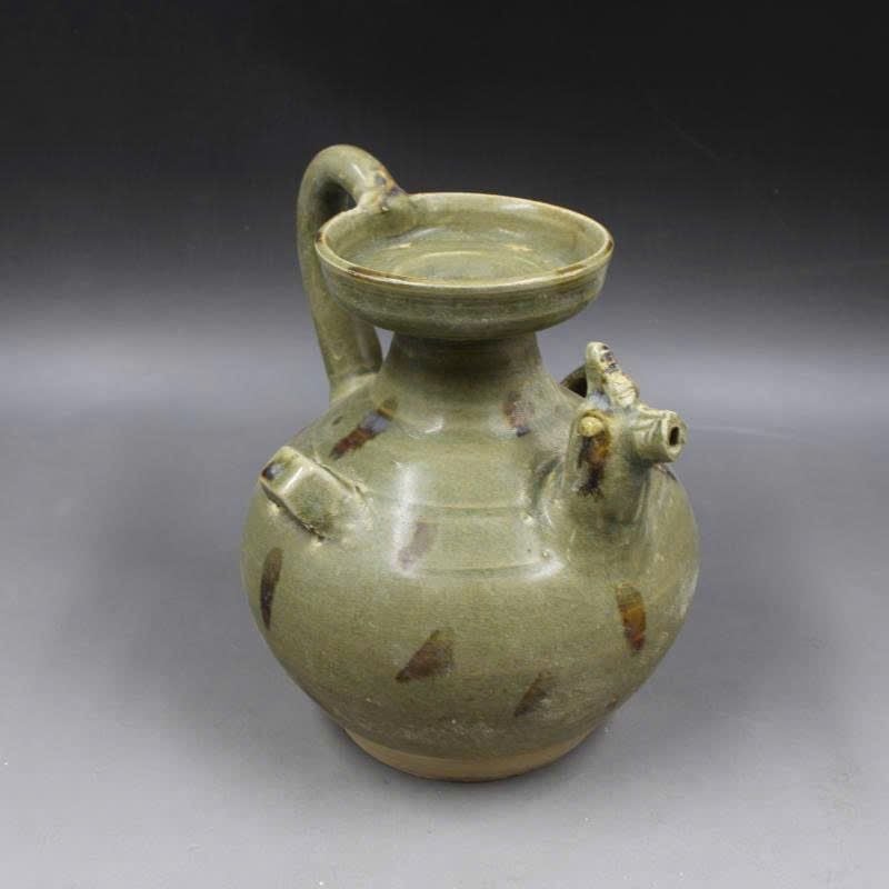  Lò nung chạm khắc đầu thú 