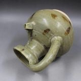  Lò nung chạm khắc đầu thú 