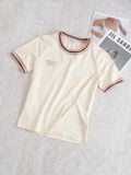  Áo phông nữ chất cotton bo viền đính tag nơ 