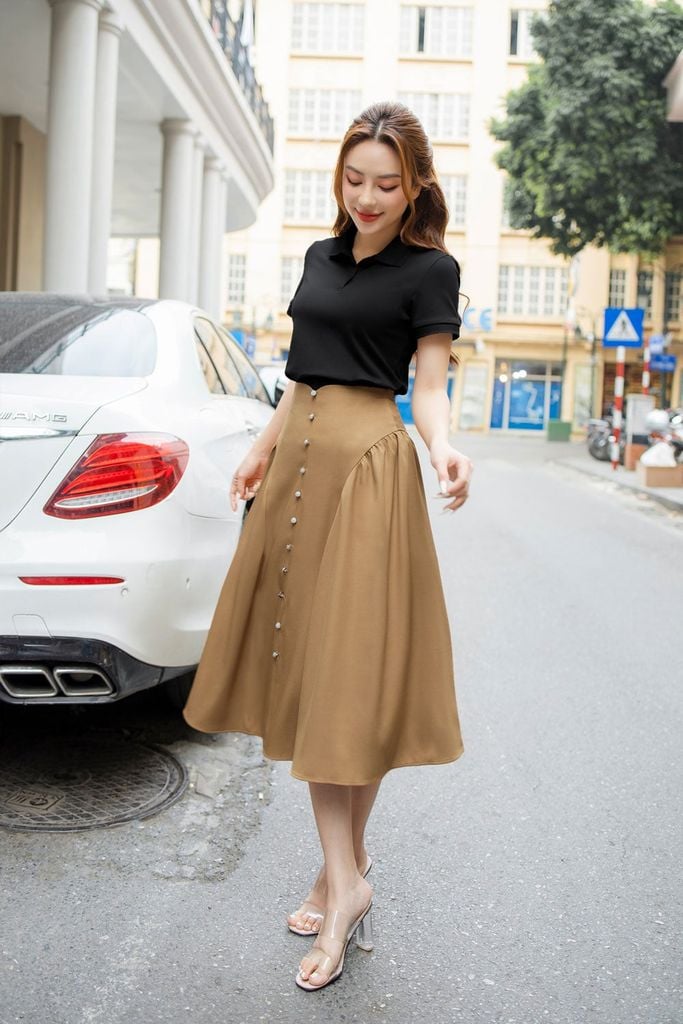  Chân váy công sở cạp cao dáng dài nhún hông. 