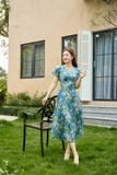  Đầm maxi NOHU 2026 thiết kế cánh tiên cổ V chất liệu tơ óng 