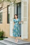  Đầm maxi NOHU 2026 thiết kế cánh tiên cổ V chất liệu tơ óng 