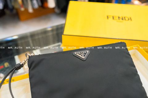  Prada Re-Nylon and Saffiano Leather Pouch. 
