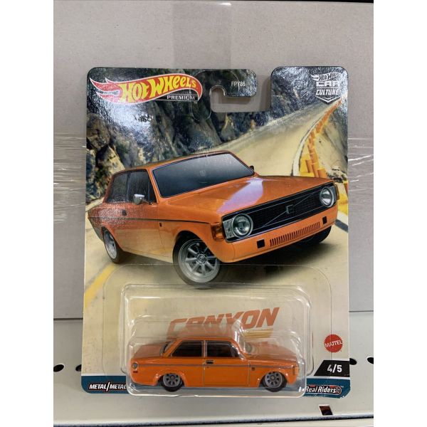 Xe mô hình HKC53 23win04 Premium Car Culture - Canyon Warriors - '73 Volvo 142 GL