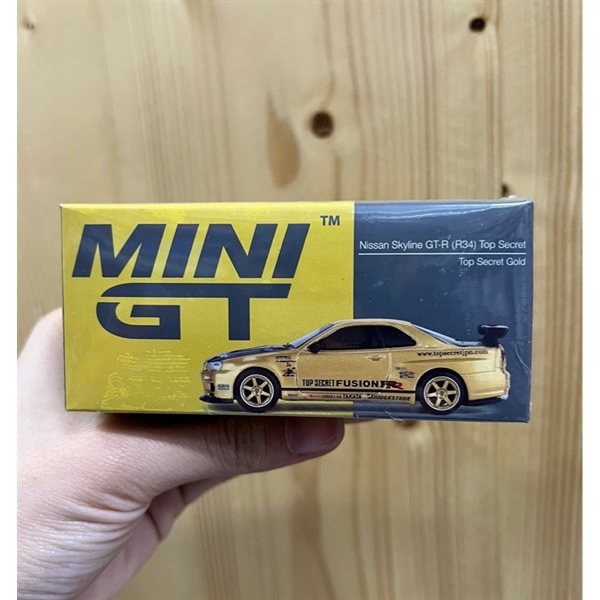 MINI GT 1/64 Nissan Skyline GT-R R34 Top Secret Gold Right Handle